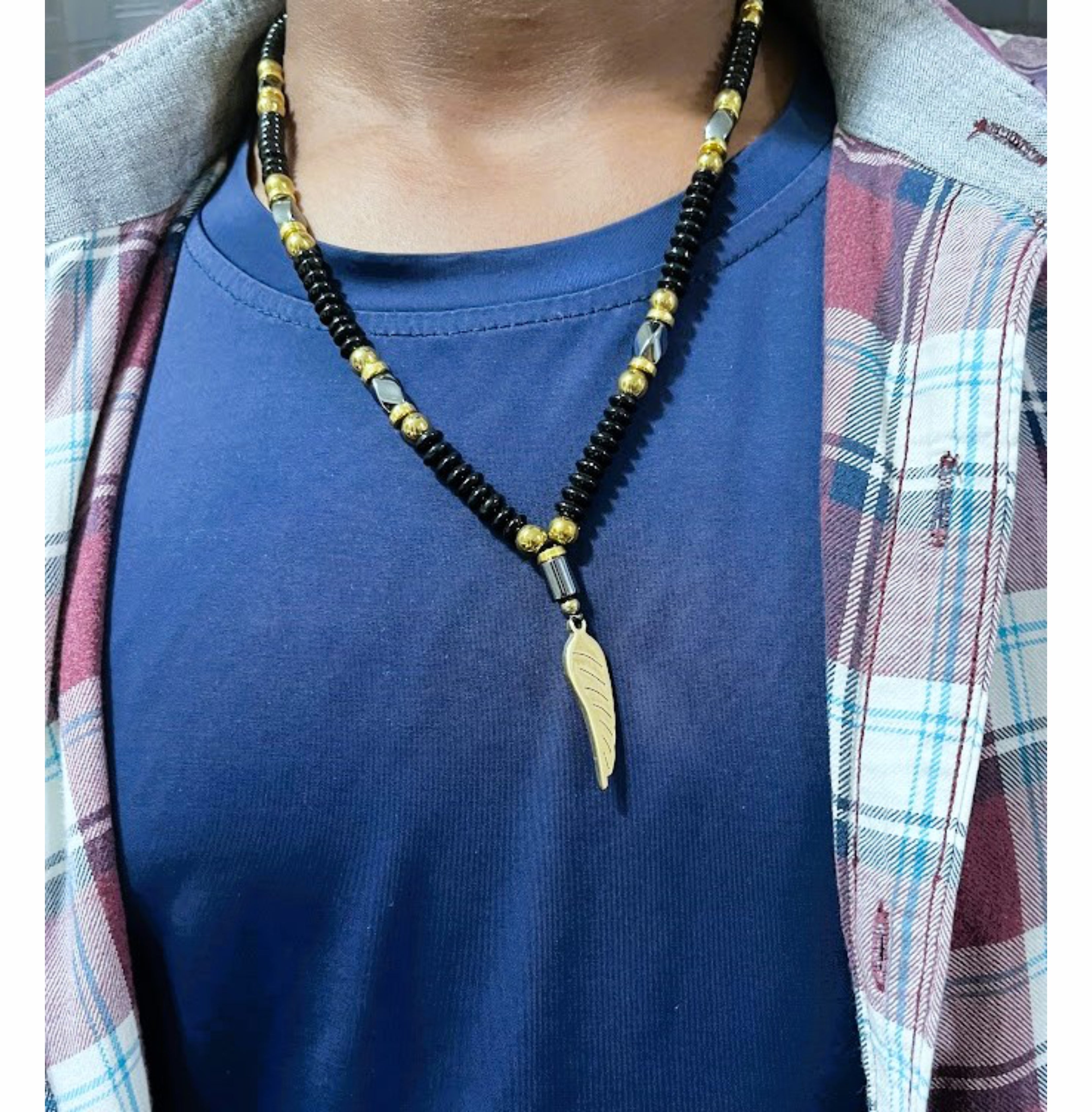 Handcrafted Black Beaded Necklace with Gold Accents and Feather Pendant for Men